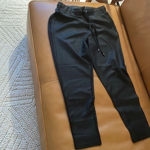 Rachel Zoe slightly shinny joggers, pockets in front, waist elastic tie